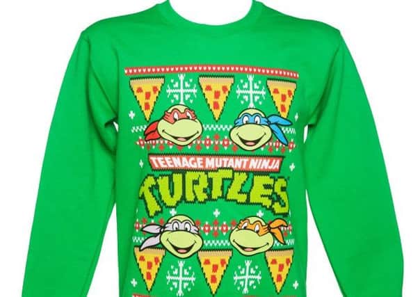 Teenage Mutant Ninja Turtles Christmas jumper, available for £29.99 from Truffle Shuffle Rock around the Christmas tree with Leonardo, Raphael, Michelangelo and Donatello this year.