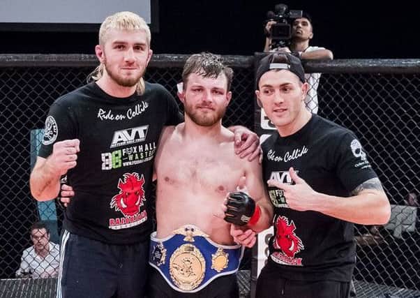 Mirfield mixed martial arts fighter Jay Furness celebrates winning the European lightweight title following his victory over Frenchman Yves Landu.