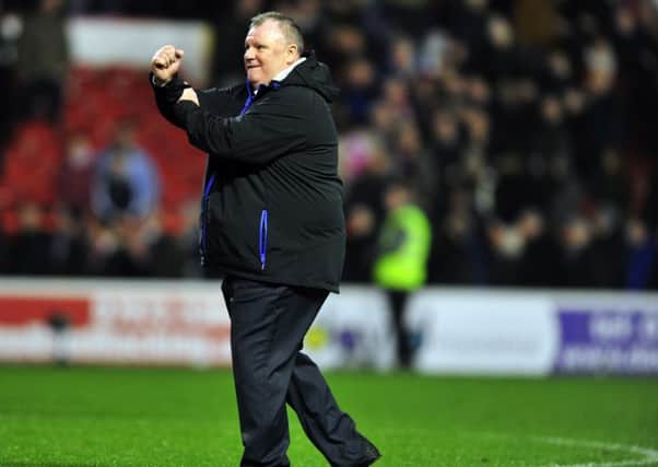 Steve Evans, pleased with his Leeds United players.