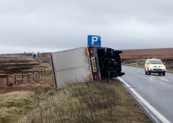 A lorry blown over by high winds on the A628 Woodhead Pass last month.