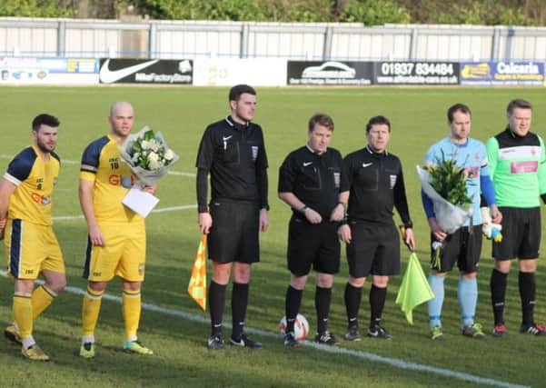 Liversedge and Tadcaster captains led tributes to Sonny-Brogan Lang. A minutes applause was also held in the 23rd minute in memory of the 23-year-old. Pics: Keith Handley.