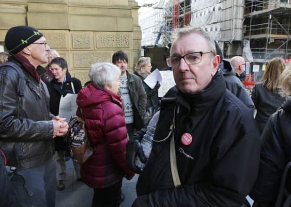 Campaigner Chris Owen at a demonstration ahead of a meeting at Halifax Town Hall  to discuss the hospitals shake up