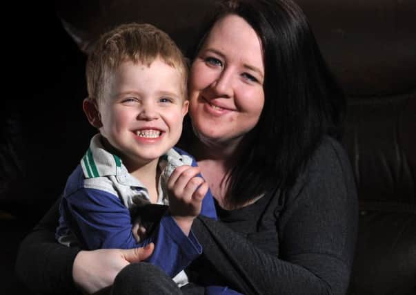Jenni Tomson pictured with her son Ryan  who is recovering after a mystery illness.