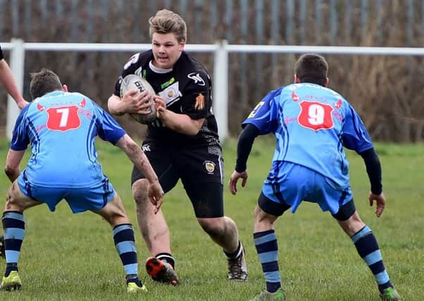 Ryan Long looks to launch a Dewsbury Moor attack against Wortley Dragons in Pennine League Division Four East last Saturday. Picture: Paul Butterfield.