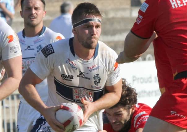Andy Ellis led Featherstone's fightback from 14-0 down against Dewsbury.