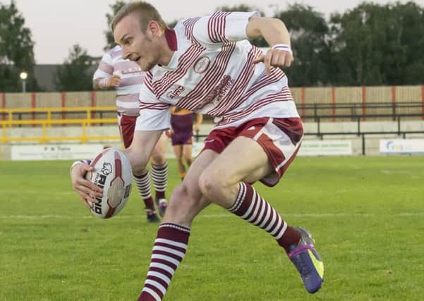 Mindaugas Bendikas scored a brace of tries to help Thornhill Trojans extend their unbeaten start in National Conference Division Two.