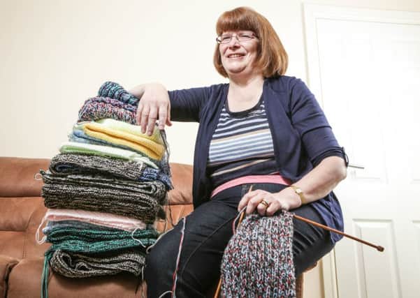 Super-knitter Julie Bruce  has completed a marathon ONE MILLION stitches in a month.