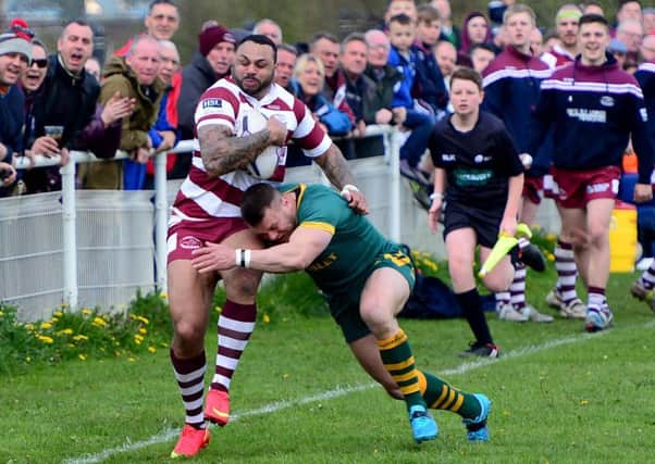 Adam Bird  races over for a terrific interception try during Thornhill Trojans  defeat in their top of the table showdown against Hunslet Parkside last Saturday. Picture: Paul Butterfield.