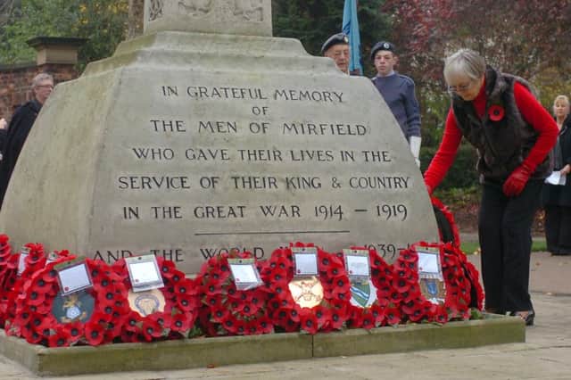 Mirfield memorial service held to mark Remembrance Day at the Ings Grove Park War memorial. (d11111154)