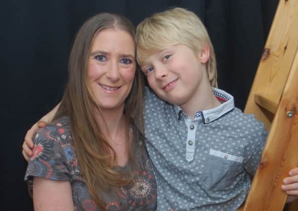 Jo Fox, a Batley-based author, and her son Oliver.
