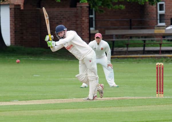 Richard Wear of Gomersal goes on the attack before rain stoipped play in his sides Bradford League Championship B game at Methley. Picture: Steve Riding