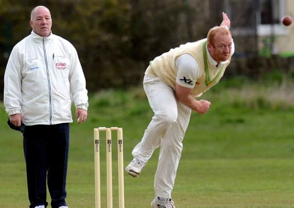 Scholes captain James Stansfield claimed 4-49 to help his side register their first win of the Bradford Premier League season as they overcame neighbours Cleckheaton on Monday.