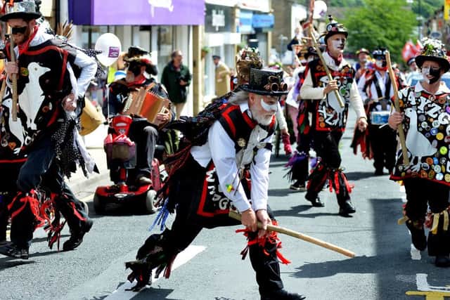 Morris dancers were part of the annual festival and parade. ab247c0616