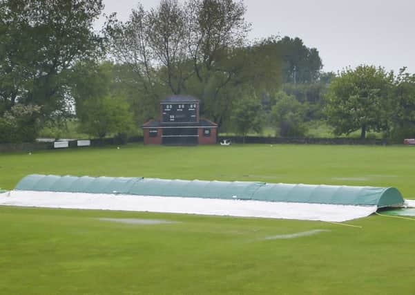 Hartshead Moor were on the brink of defeat when rain stopped play.