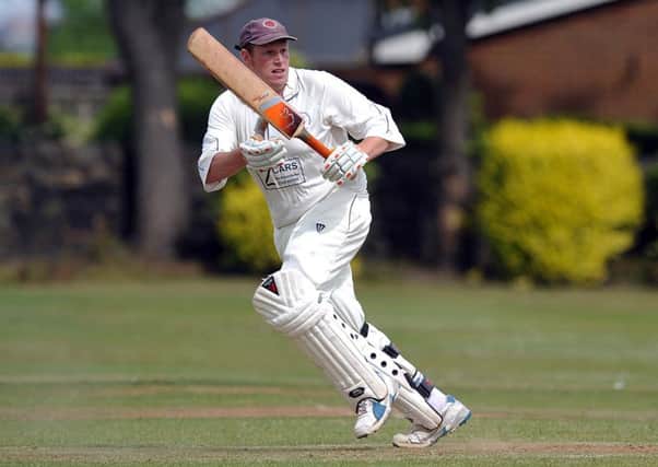 Paul Cooper top scored with 37 as Heckmondwike and Carlinghow defeated Bradford League Conference high fliers Buttershaw St Pauls.