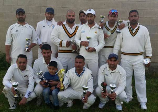 Kashmir celebrate winning the Dewsbury District Section B Twenty20 Cup.