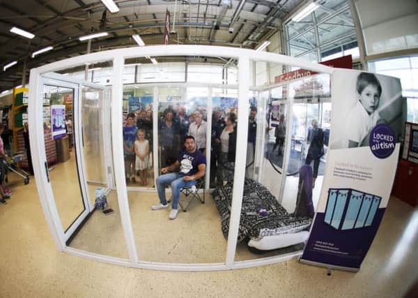 Micky Lockey from Hemsworth, is spending 50 hours locked inside a glass box, located in the foyer of the Tesco superstore in Hemsworth to raise awareness of autism, and the work that the national charity Caudwell Children does in supporting children with the condition.