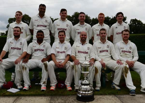 Woodlands pictured with the Priestley Cup following their 115-run victory over Pudset St Lawrence at Spen Victoria last Sunday. Pictures: Paul Butterfield