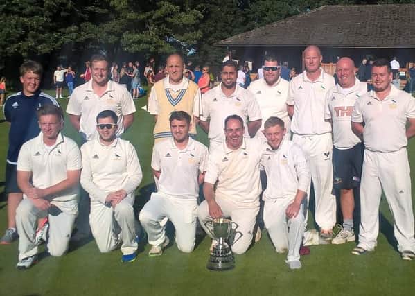 Hanging Heaton celebrate winning the Solly Sports Crowther Cup at Cawthorne with victory over East Bierley on Bank Holiday Monday. Pictures: Richard Kosmala