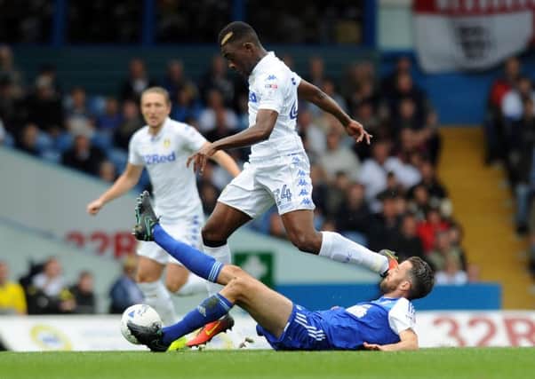 Leeds United winger Hadi Sacko is challenged by Ipswich Town's Cole Skuse. Picture: Simon Hulme