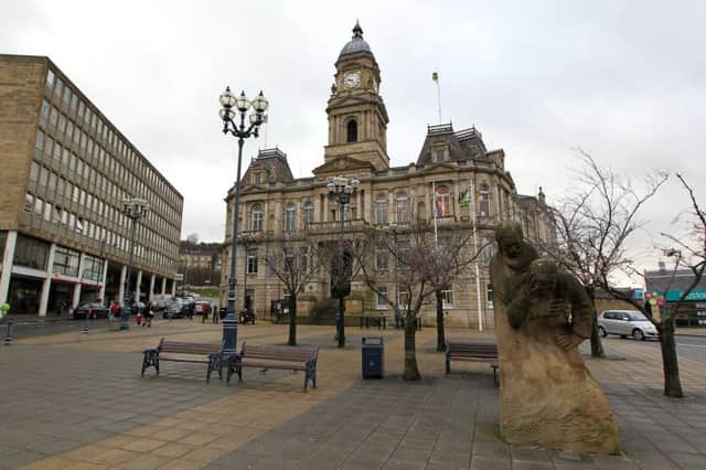 GV's to go with a story about a redesign of Dewsbury town centre. Idea is that Market Place and the Town Hall Square are too busy with clutter (benches, plant boxes, bandstands etc) and council are going to clear it up to make it more attractive, better to walk around.