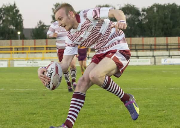 Mindaugas Bendikas scored a hat-trick of tries as Thornhill defeated Stanningley to book a place in the National Conference Division Two play-offs.