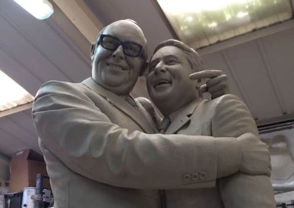 The new Morecambe and Wise sculpture in clay during the sculpting process.