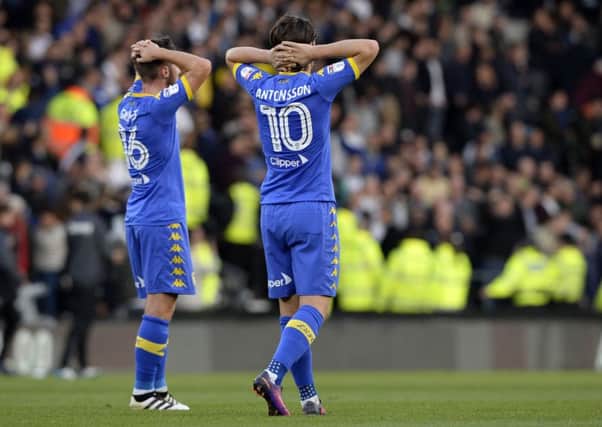Disappointed Leeds United duo Matt Grimes and Marcus Antonsson at full-time at Derby. Picture: Bruce Rollinson