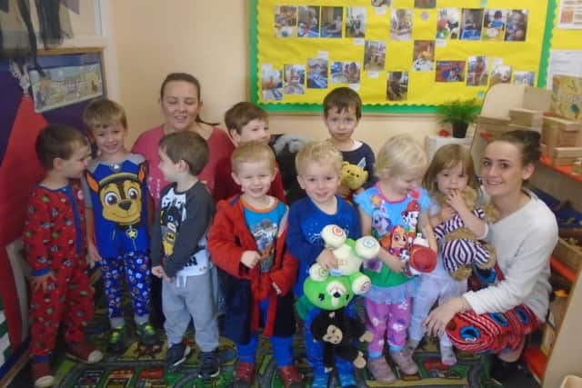 BEARS NECESSITY: Children at the Little Acorns Nursery brought in their teddy bears for the pyjama fun day.