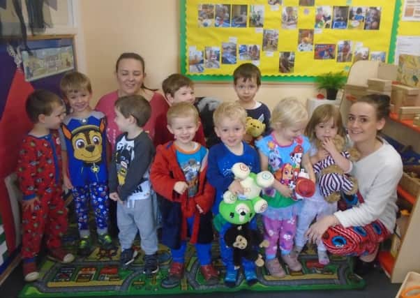 BEARS NECESSITY: Children at the Little Acorns Nursery brought in their teddy bears for the pyjama fun day.