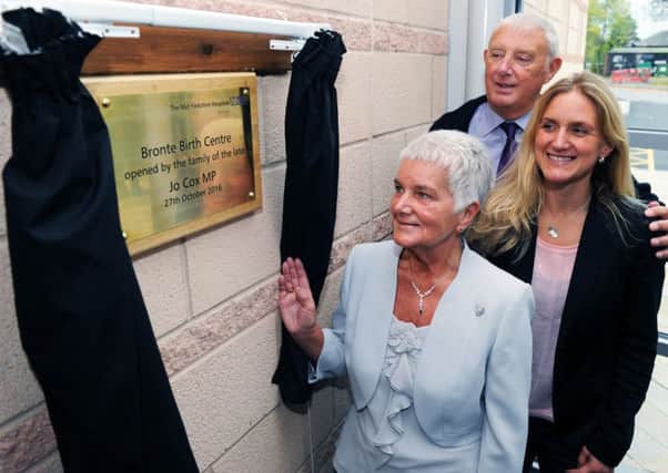 The parents of the late Jo Cox MP Jean and Gordon Leadbeater and her  Kim unveil a plaque to officially announce the opening of the new Bronte Birth Centre.