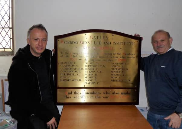 Roger Thompson and Rev Mark Umpleby with the Batley WMC memorial plaque.