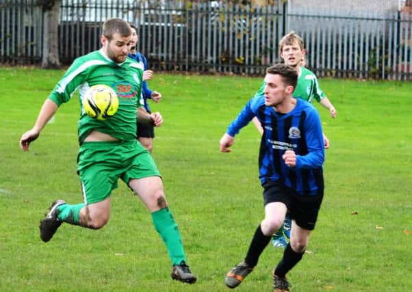 Thornhill United's Chris Goodwin in action during his side's 3-1 defeat to Forthergill Whittles in Huddersfield League Division Four last Saturday.
Pic: Dave Jewitt
