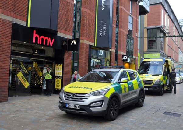 25 November 2016 .......     Police at a stabbing incident at HMV in Lands Lane, Leeds. Picture Tony Johnson