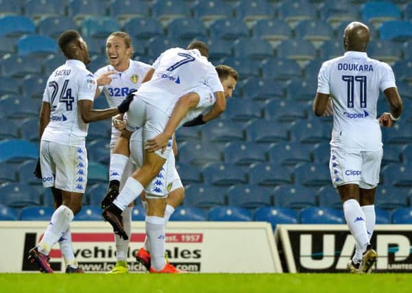 Leeds United players celebrate Chris Wood's opening goal against Reading.  Picture:  Bruce Rollinson