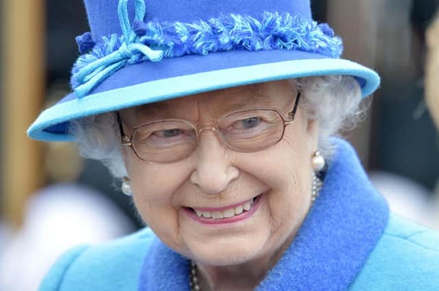 File photo dated 9/9/2015 of  who is to step down as patron from a number of national organisations at the end of her 90th birthday year, Buckingham Palace said. The patronages will be passed on to other members of the Royal Family. PRESS ASSOCIATION Photo. Issue date: Tuesday December 20, 2016. See PA story ROYAL Queen. Photo credit should read: Owen Humphreys/PA Wire