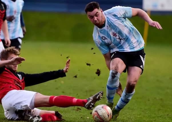 Joe Walton scored his 20th goal of the season as Liversedge earned a 2-2 draw away to Athersley Recreation on Monday.