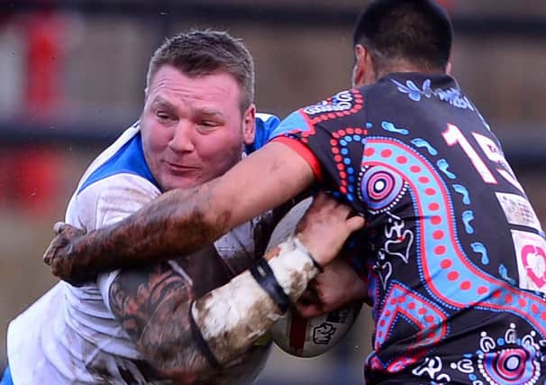 Dewsbury Rams prop Tony Tonks drives at The Yowies defence in Sundays pre-season friendly.