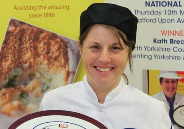 photo of Tracy Healy, the new LACA Yorkshire & Humber School Chef of the Year 2017 from this morning's Regional Final with her Winner plaque and winning dishes.
