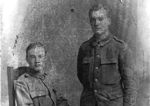 Thomas Hirst is pictured (standing) with his brother Arthur.