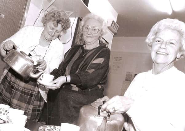 A welcome cuppa for members of the Over Fifties Club over 25 years ago. Pictured (from left): Mrs Vera Swift, Mrs Nora Taylor and Mrs Mary Croxall.