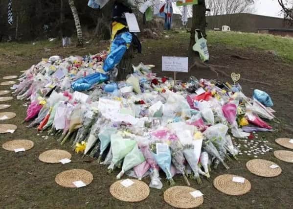 Tributes left at the scene of the accident on Gelderd Road.
