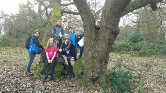 ROUTE MASTERS: Air Cadets from Mirfields 868 Squadron take a rest near a tree during the trek.