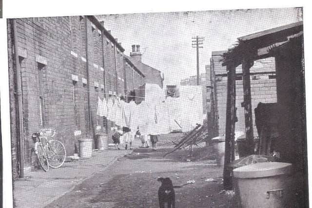 LONG GONE: This mystery photograph captures a street in Dewsbury, but can you name the street in question?