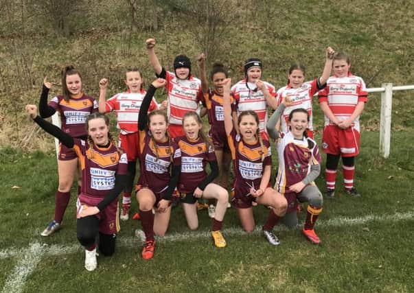 Dewsbury Moor Under-12 Girls pictured with opponents East Leeds following their first game last weekend.