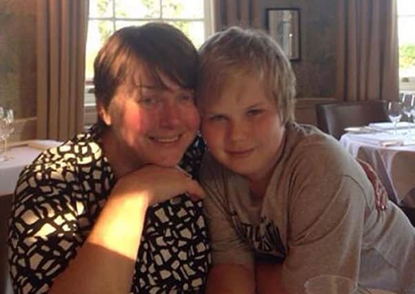 Sam Forbes, 11, had the Pandemrix jab, pictured with mum, Di.