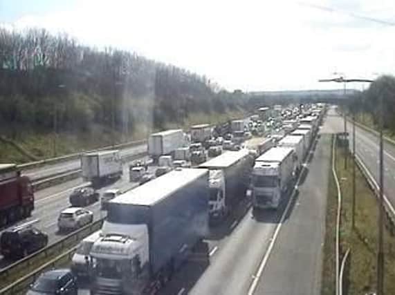 Traffic queuing on the M62 eastbound carriageway.