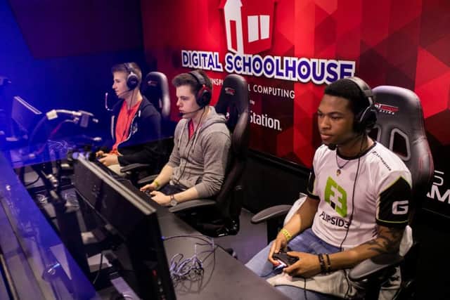 IN CONTROL: Students compete in the eSports Grand Final.