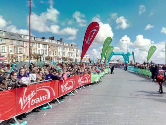 Crowds gather for the start of the Tour de Yorkshire.