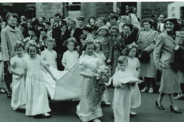 WHITSUNTIDE WALK: This photograph of a procession by St Saviours Church members was taken in Ravensthorpe in 1954. Phot loaned by Pat Varley.